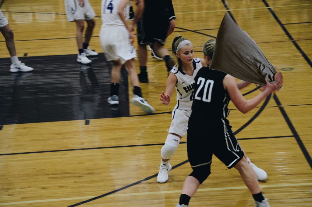 Pillow Fight erupts on the court of a womens basketball game