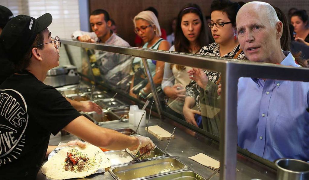 Rick Scott in line at the Chipotle trying to order a burrito in Spanish