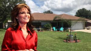 Sarah Palin stands outside of her new home in Hernando County