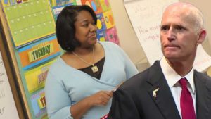 Rick Scott condemns teacher for working two jobs